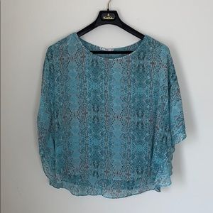 Flowy blue snakeskin-like top